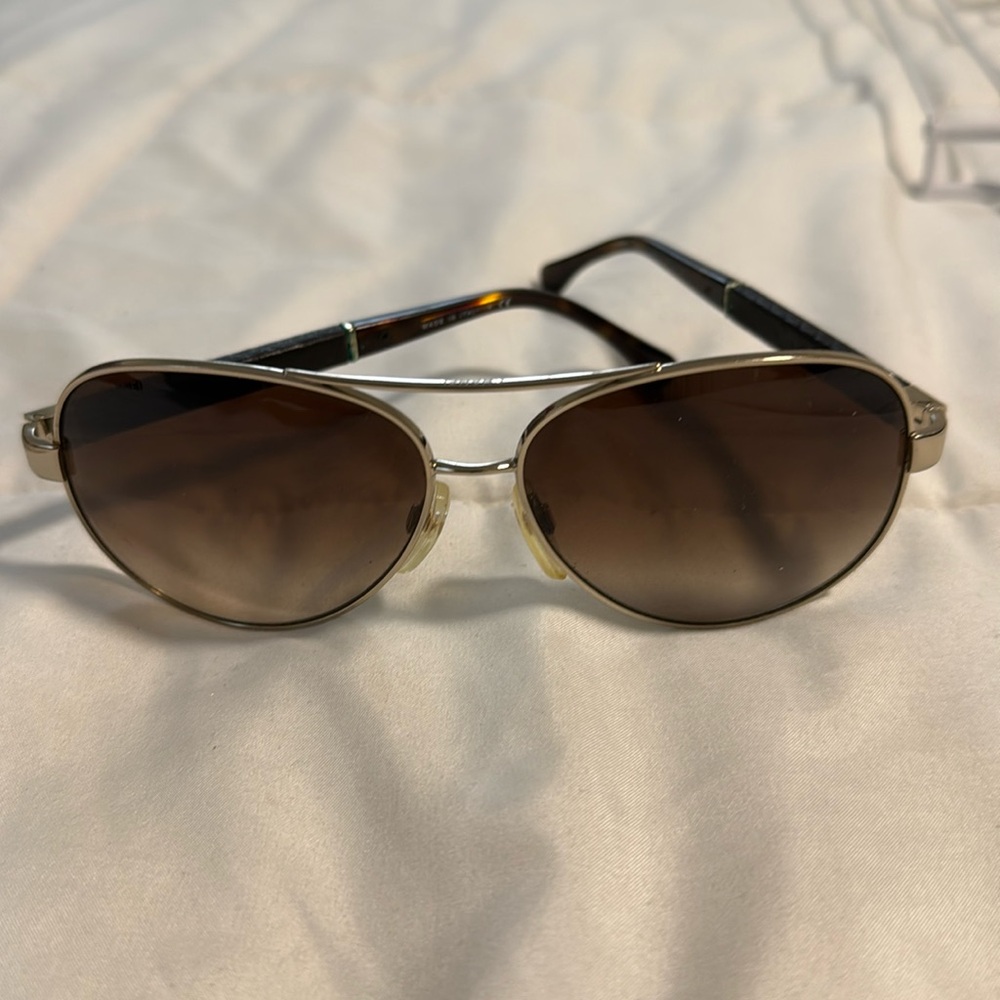 AUTHENTIC Chanel 
Tortoiseshell Gold Tone Metal
CC Logo & Quilted Pattern